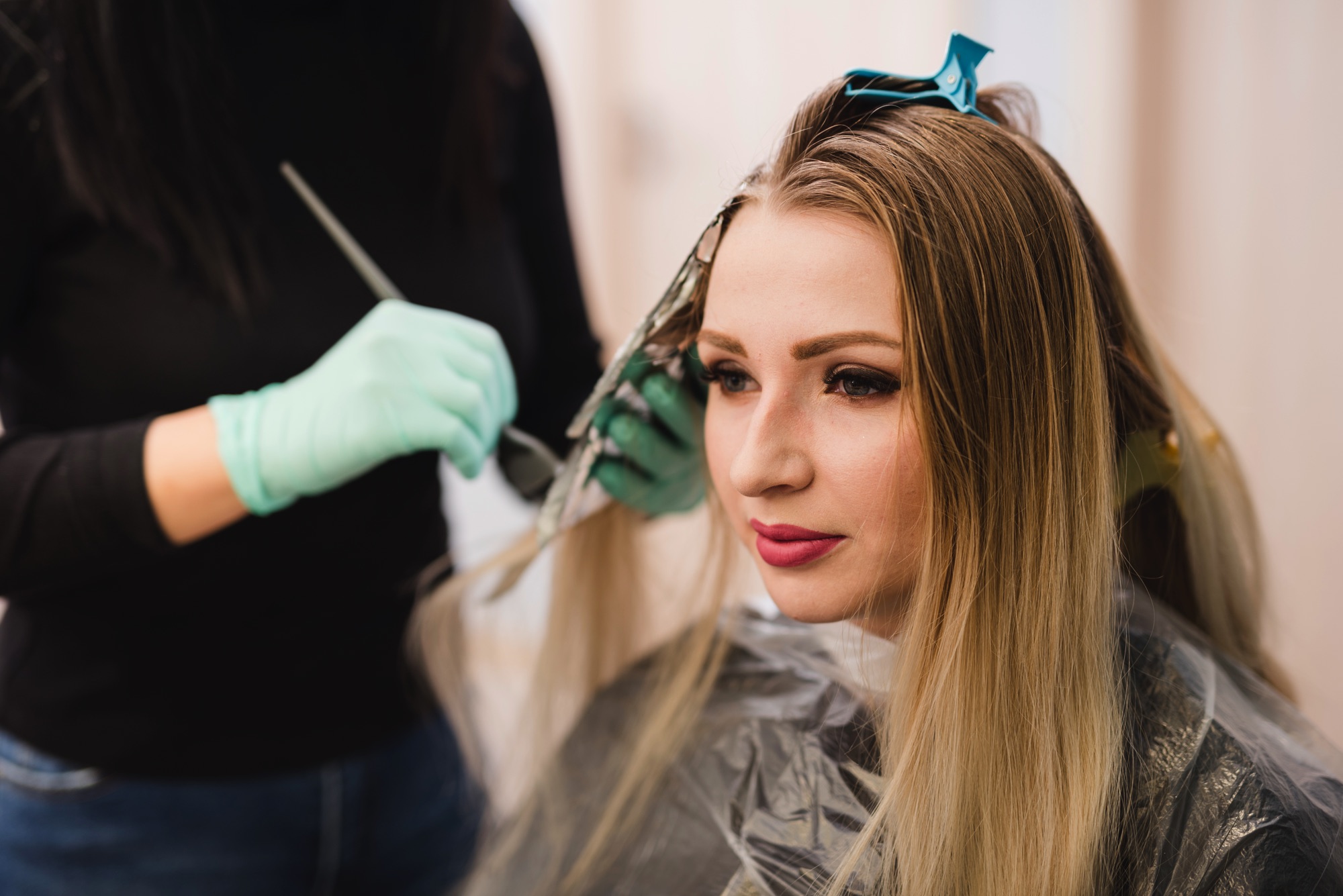 blonde-girl-getting-her-hair-dyeing
